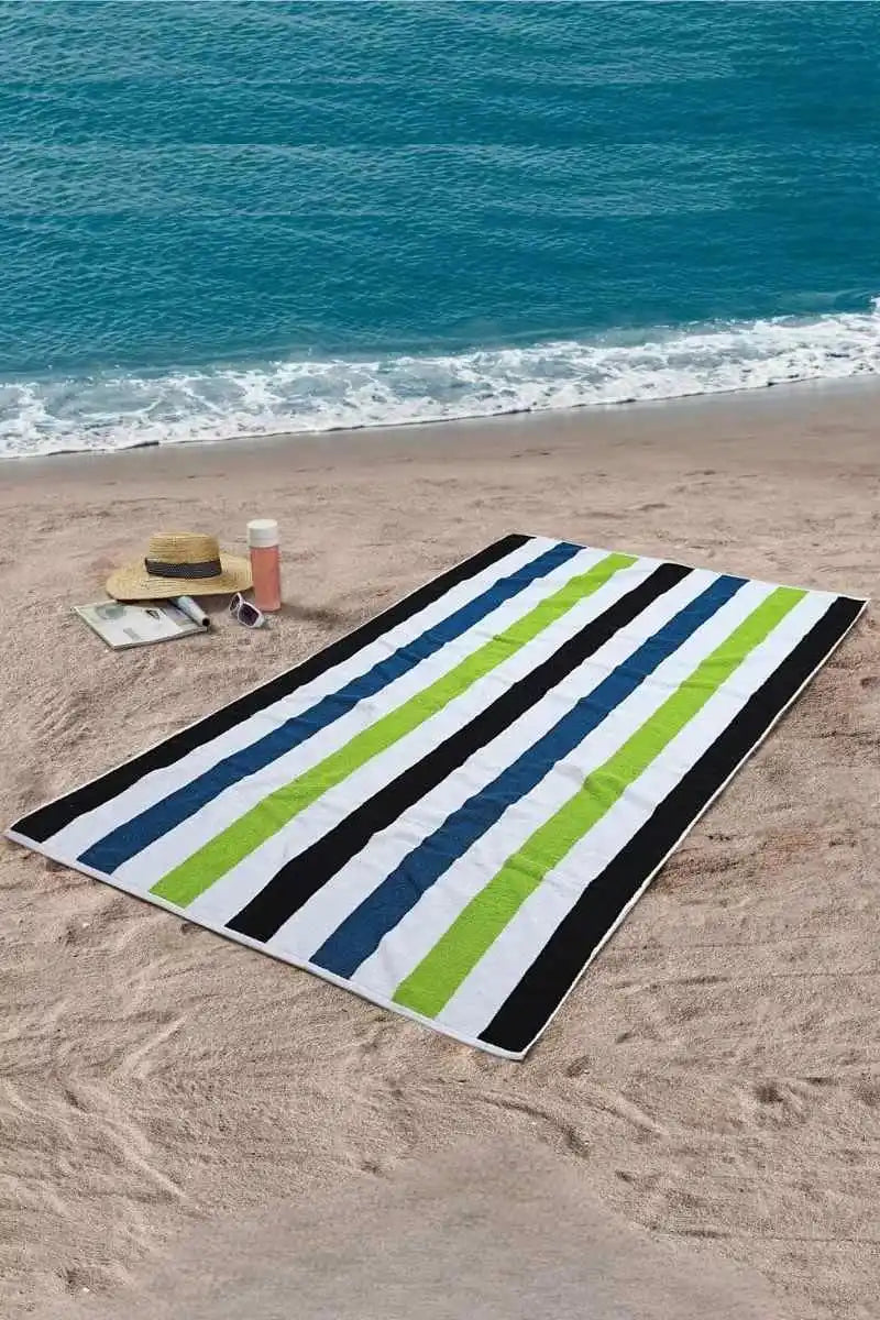 Luxury beach towel styled on a relaxing beach setting for New Zealand summer living